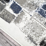 Cream grey blue black abstract low pile living room rug - view 4